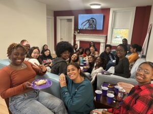 Diverse group of women of color smile with brunch in hands